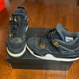 air jordan 4s black and gold grade school 6